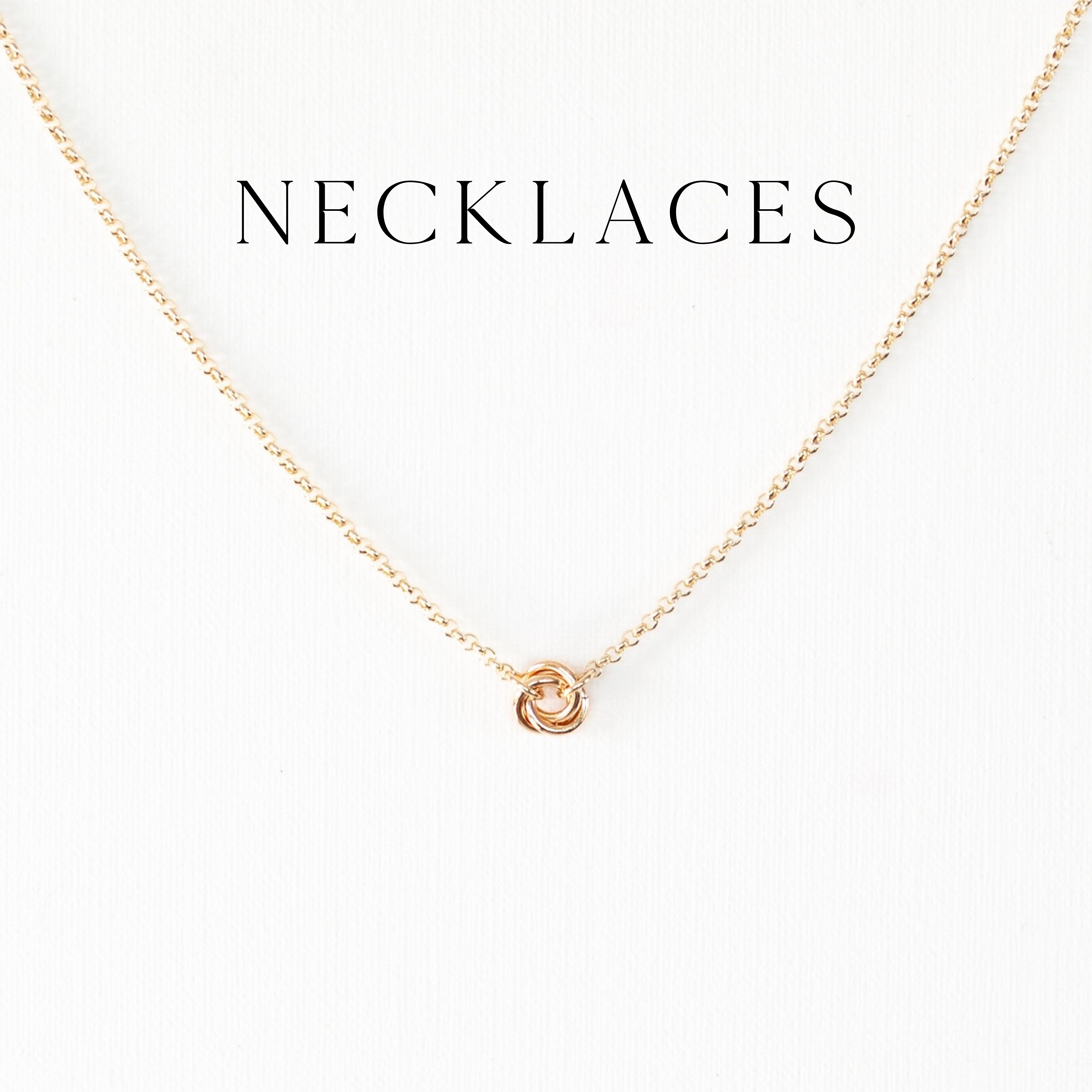 Gold_Love_Knot_Necklace_on_Gold_Chain